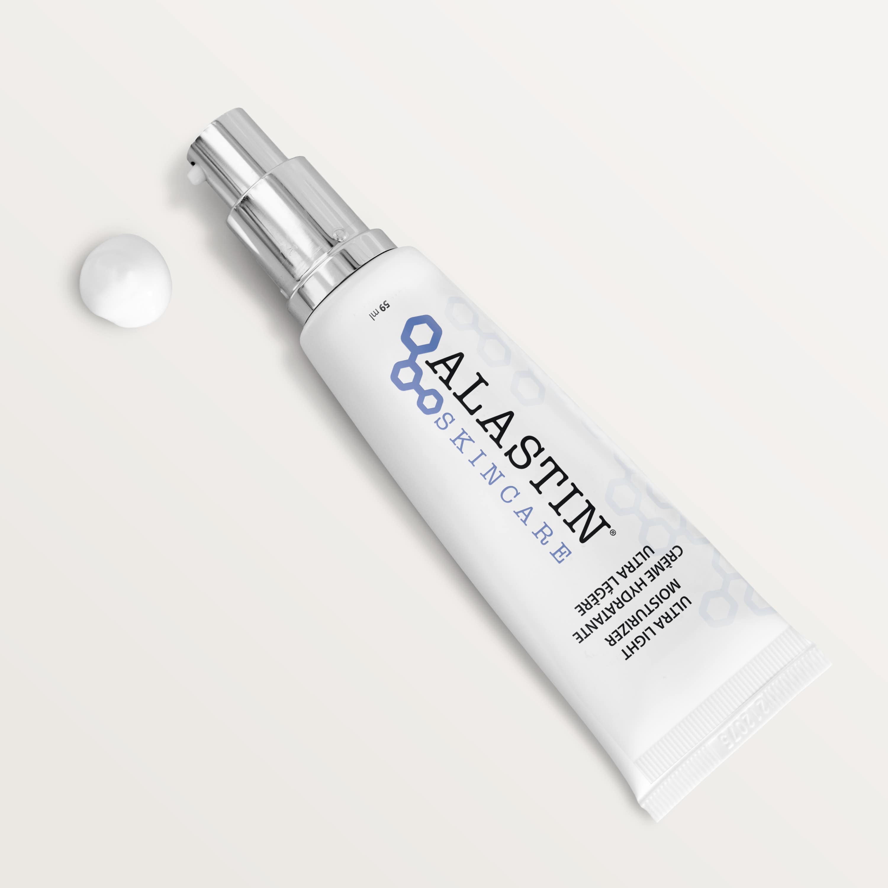 Alastin Ultra Light Moisturizer, with a cream swatch packaging