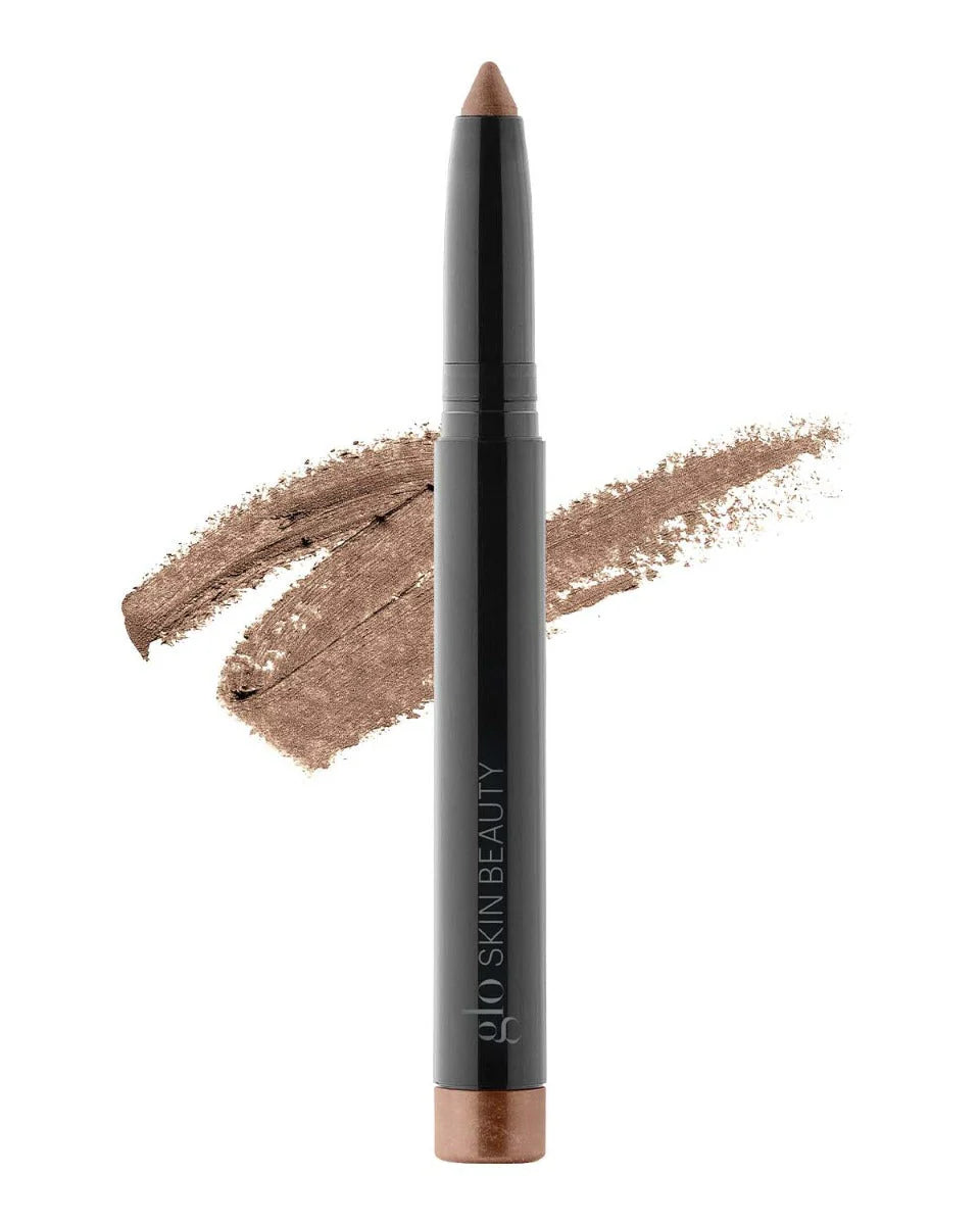 Keepsake Cream Stay Shadow stick with bronze color and brand logo on a white background