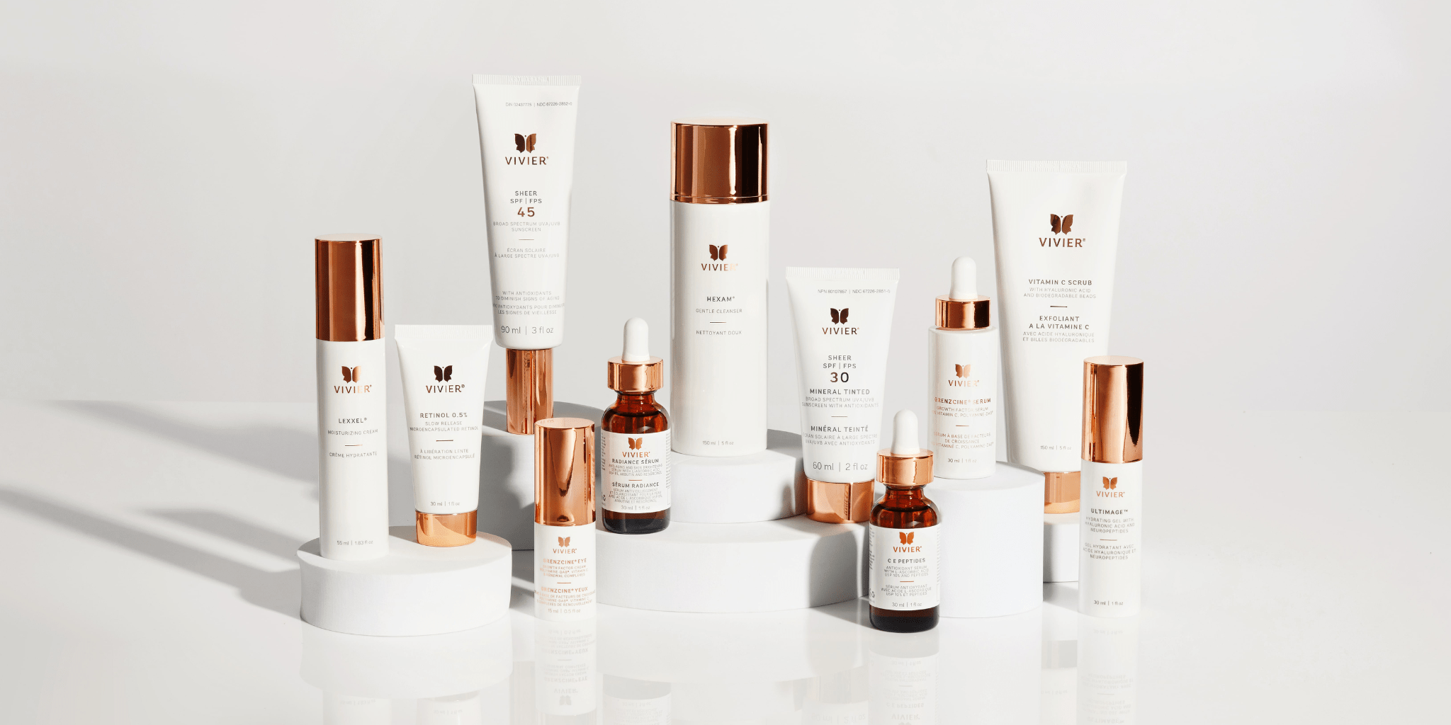 Collection of Vivier Skincare products lined up with a white background